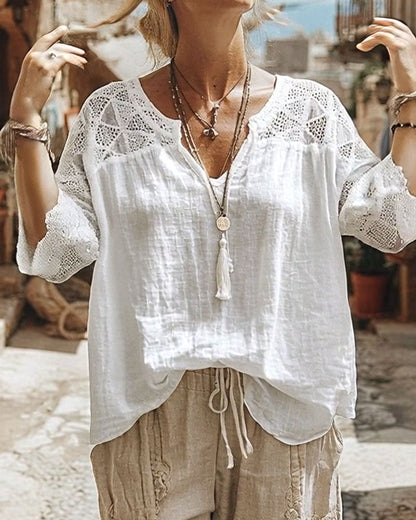 Cynthia | Blusa con scollo a V e dettagli in pizzo
