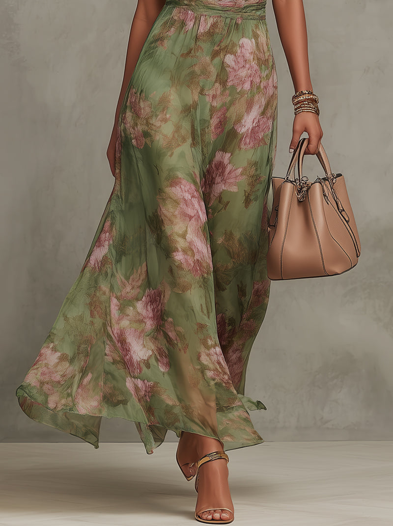 Serena · Vestido largo verde floral de gasa con escote halter